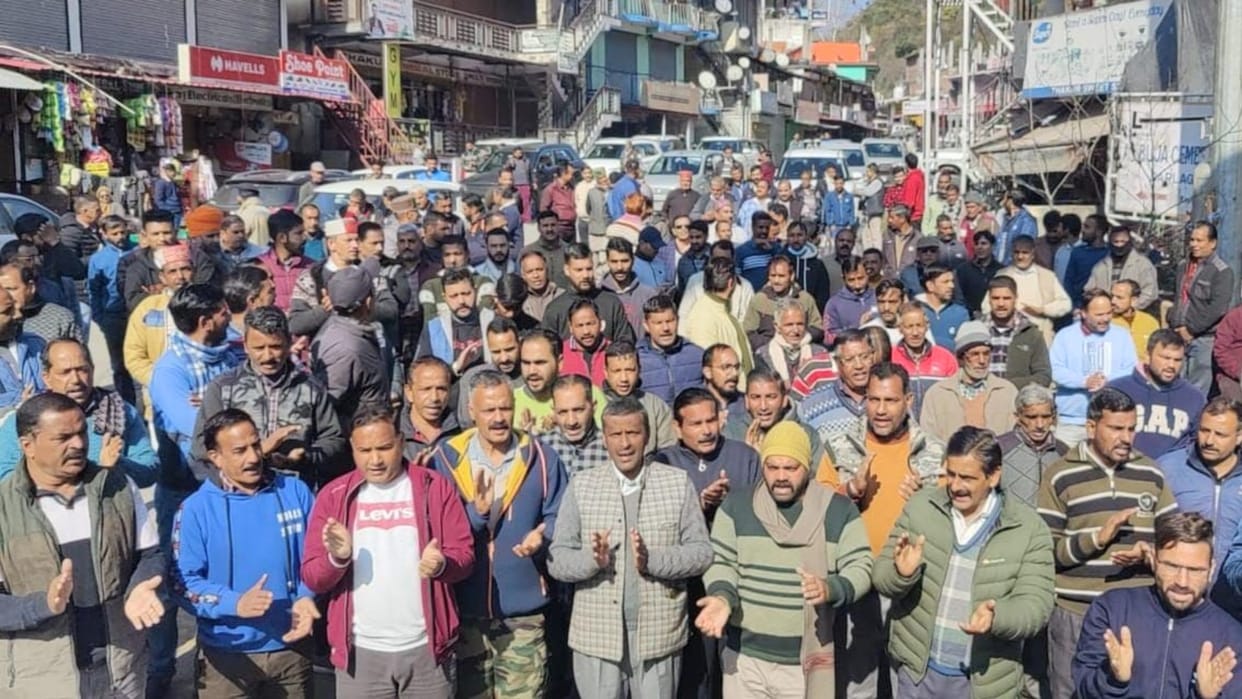 adani go back slogan by truck operators in darlaghat ambuja cement plant