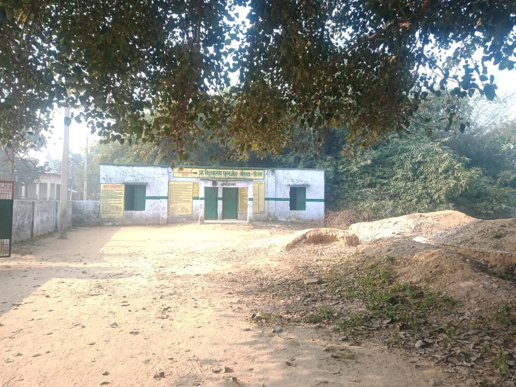 School building demolished, children somehow sitting in extra room