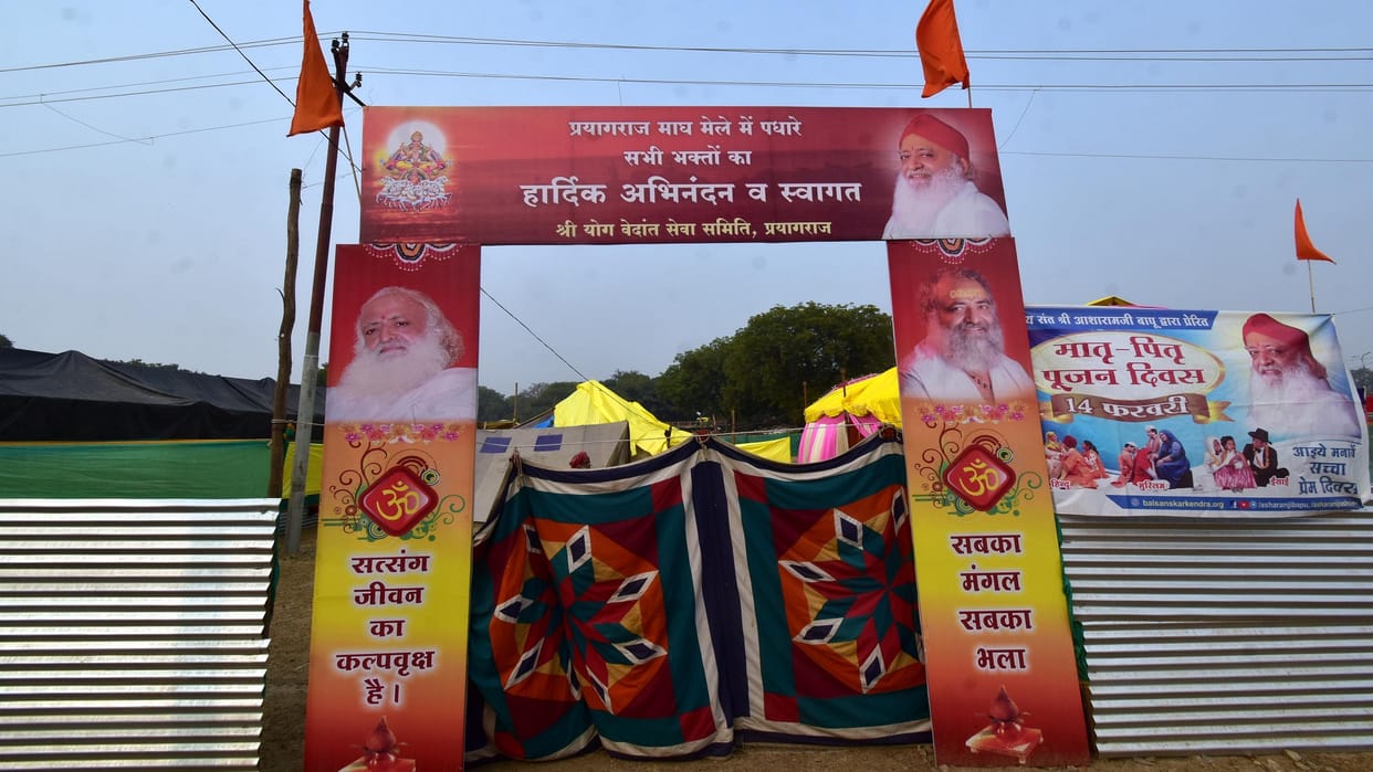 Camps of tainted Babas among ascetics in Magh Mela grand gates with pictures made