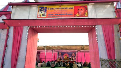 Camps of tainted Babas among ascetics in Magh Mela grand gates with pictures made