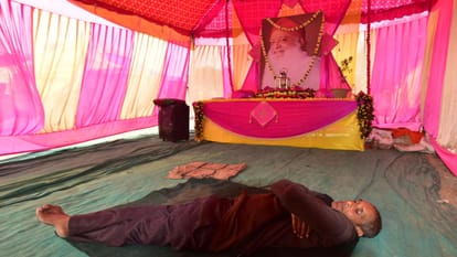 Camps of tainted Babas among ascetics in Magh Mela grand gates with pictures made