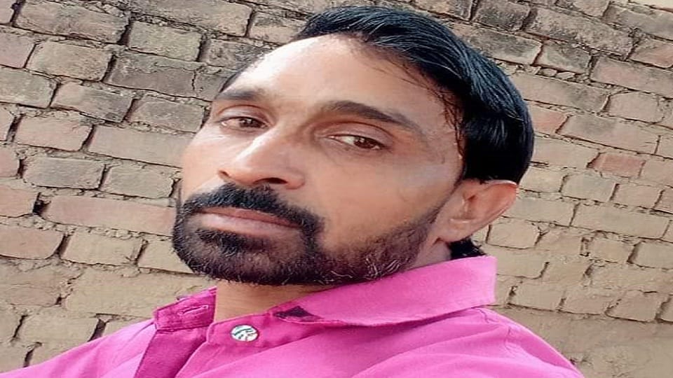 young man dead body found lying in field