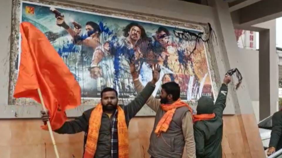 Hindu Mahasabha activists torn posters of Pathan Movie announced not allow to be released in theaters in Agra