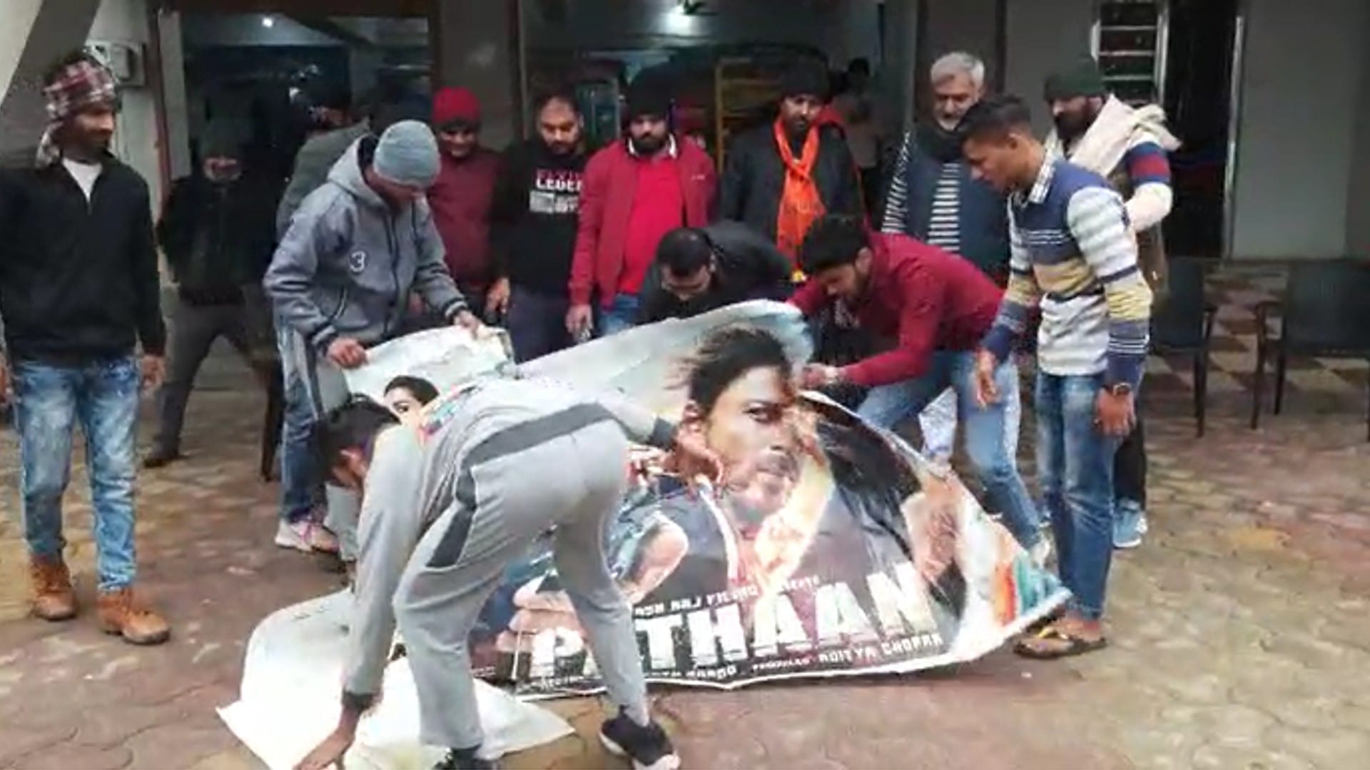 Show of film Pathaan canceled in Morena as well, Bajrang Dal activists tore posters of the film, set it on fir