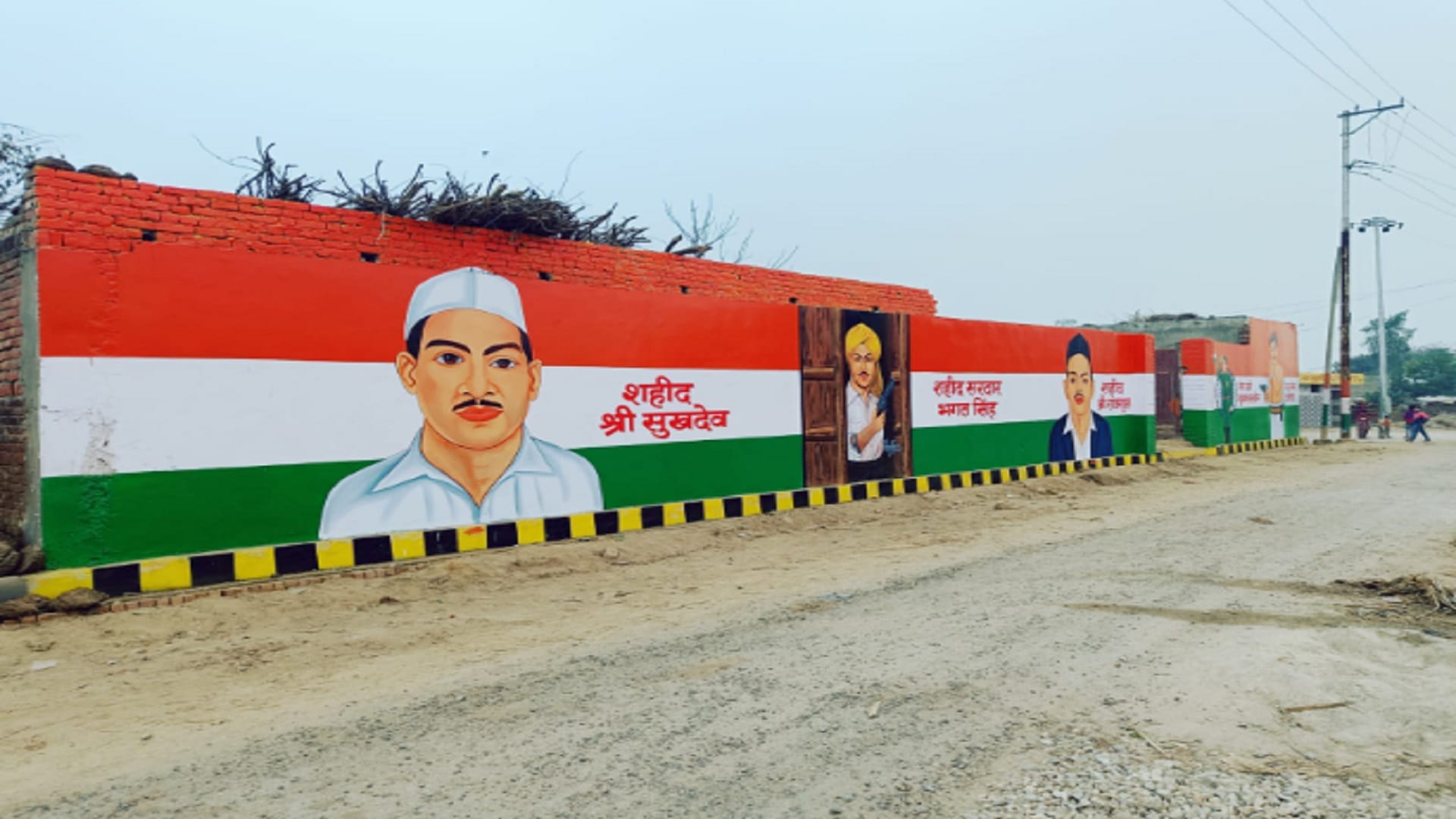 Anil painted martyr Bhagat Singh and other pictures on walls of his house in village Kuti of Sanjeev Balyan