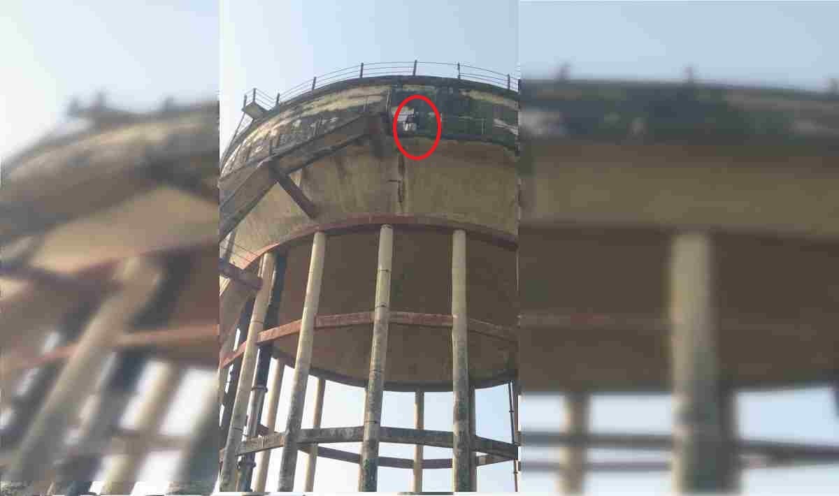 young man climbed on  water tank in bhadohi said if road is not made I will jump for suicide