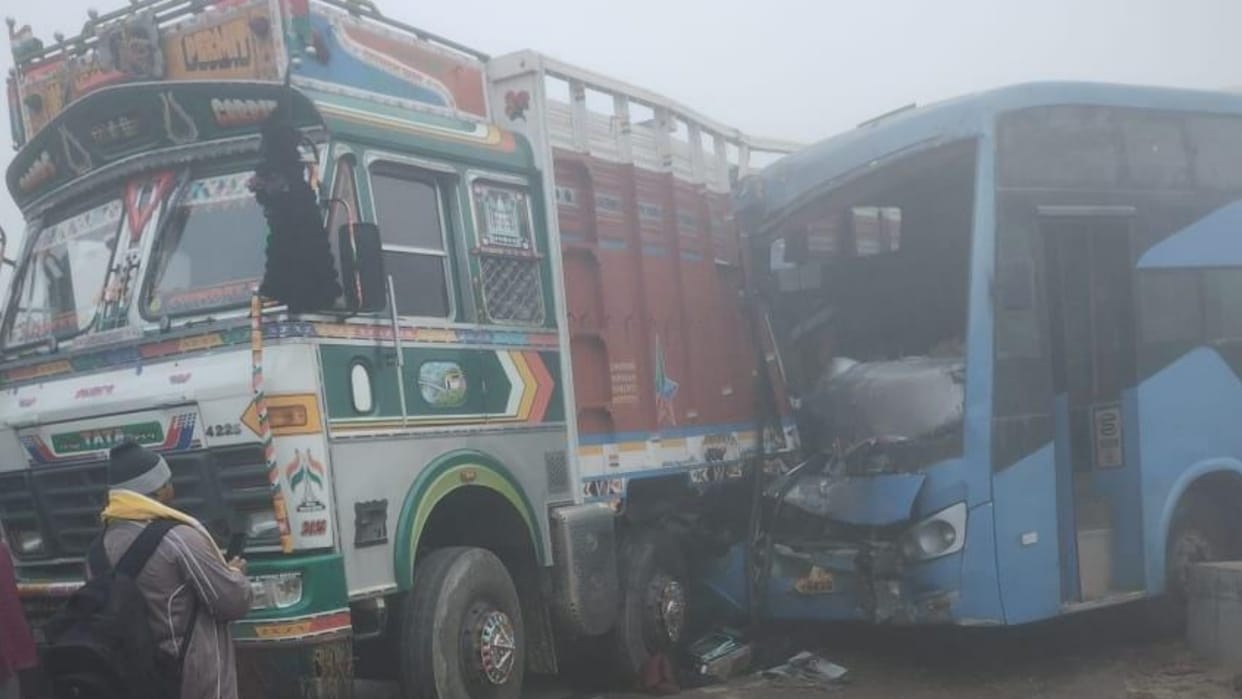 double decker bus full of baratis collided with truck