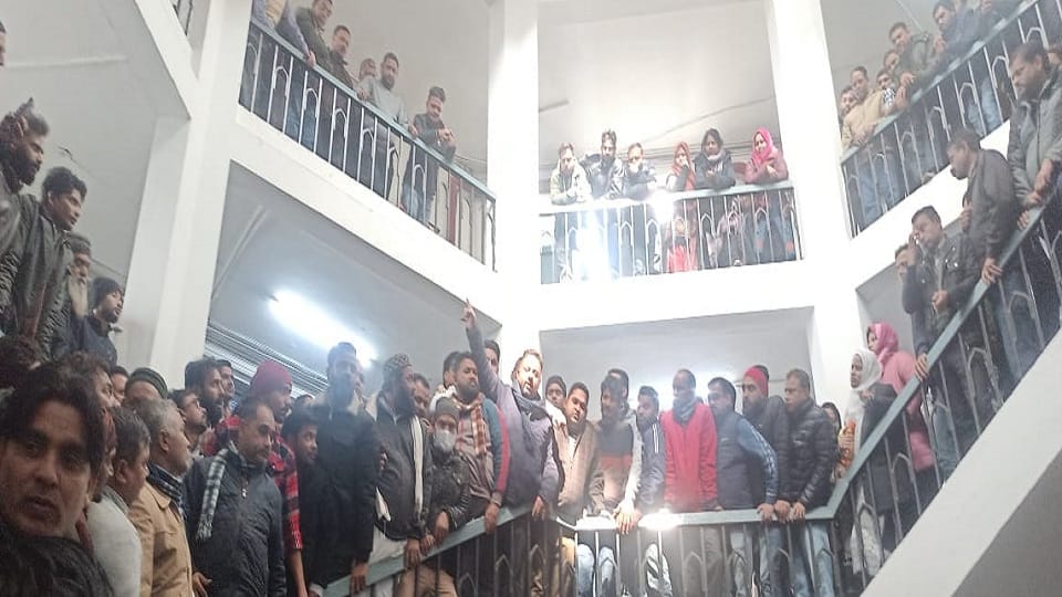Temporary employees surrounded AMU registrar office