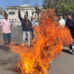 करणी सेना ने फूंका सपा नेता का पुतला