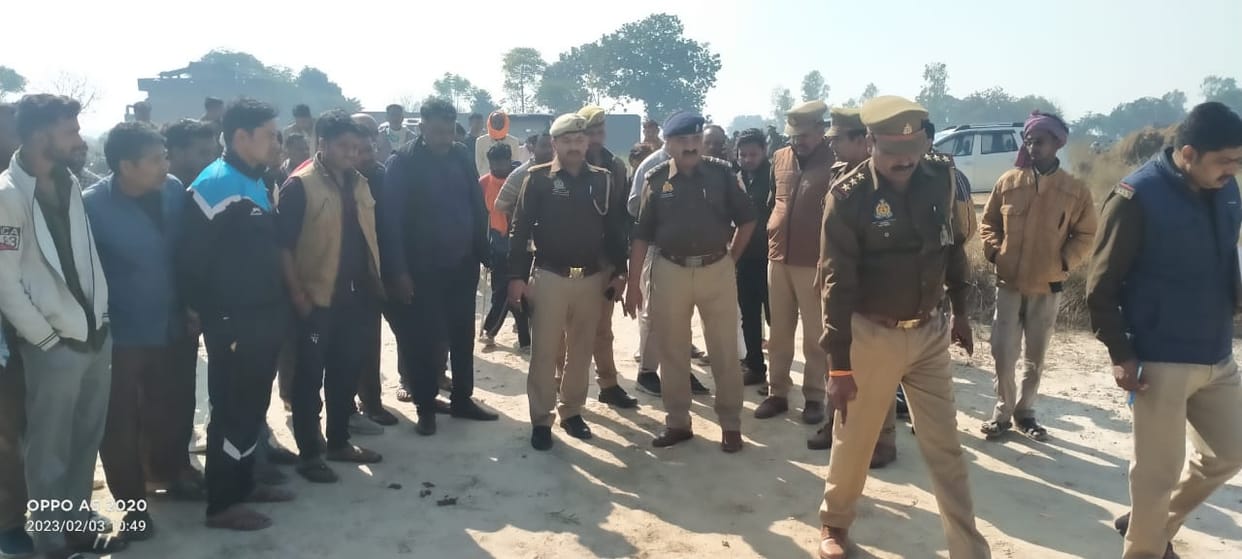 The half-burnt body of a young man found in the field in Fatehpur