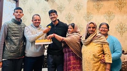 Family celebrates by feeding laddoos to Kamal Chowdhary