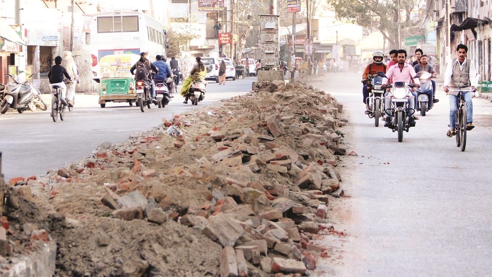 Somewhere road carved and somewhere dividers uprooted
