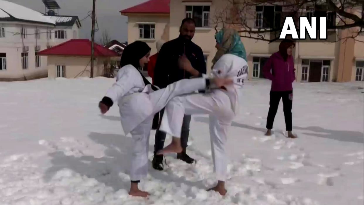 Jammu Kashmir: Girl learning martial arts tricks barefoot in the snow in Budgam