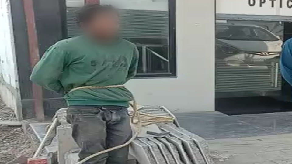 young man was tied to a pole and beaten by people in bareilly