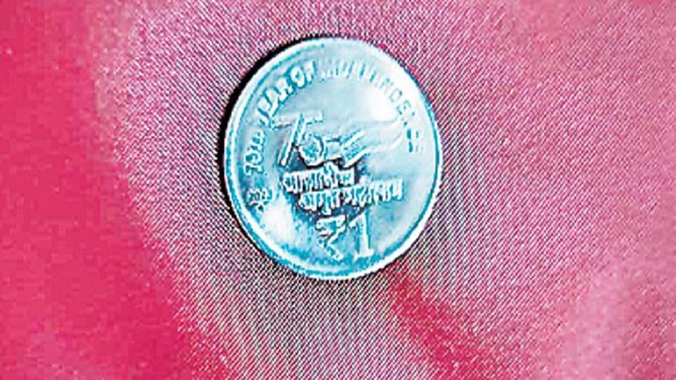 cost of one rupee coin is 50 rupees coin was released this year it is very small in size