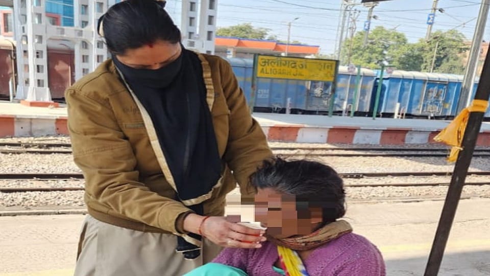 By risking constable saved the passenger from going under the train
