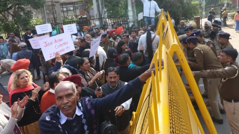 Aided College Teachers protest for their demands in chandigarh