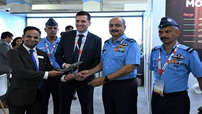 Indian Air Chief Marshal VR Chaudhari visited various aerospace sector stalls on display in Aero India