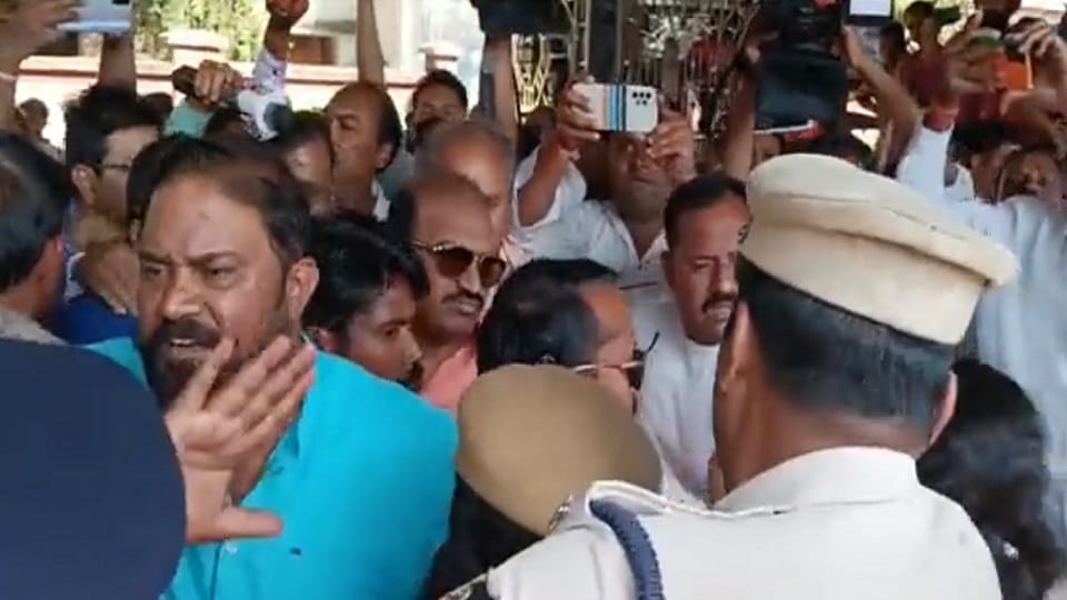 Watch Video Odisha BJP Leader Jaynarayan Mishra  Allegedly Shoves Woman Cop, He Denies It