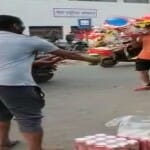 कांवड़ियों को बीयर बांटता युवक