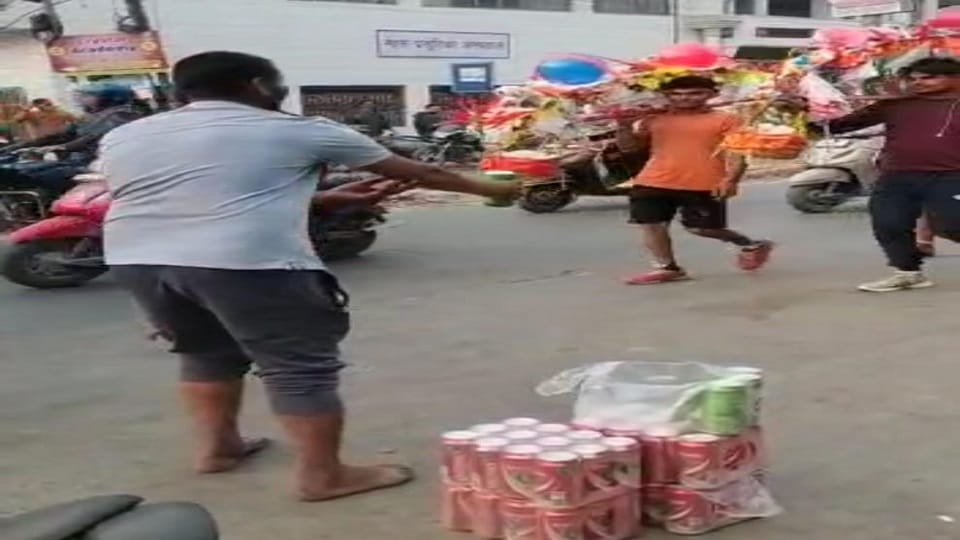 Young man distributing beer to Kanwariyas case filed in Aligarh