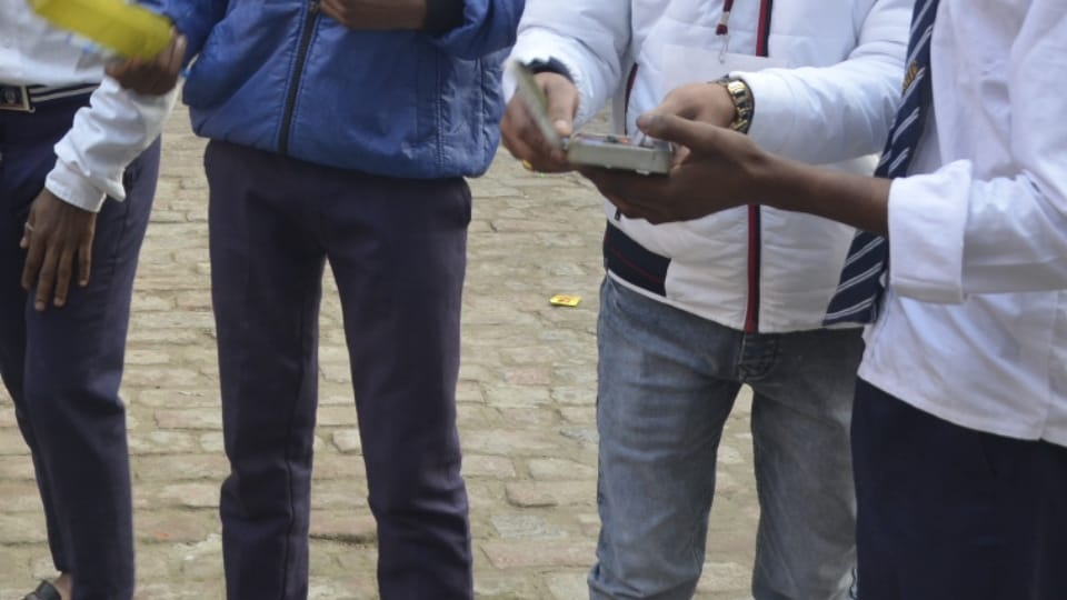 examiner caught student with copying in Inter Hindi subject exam in budaun