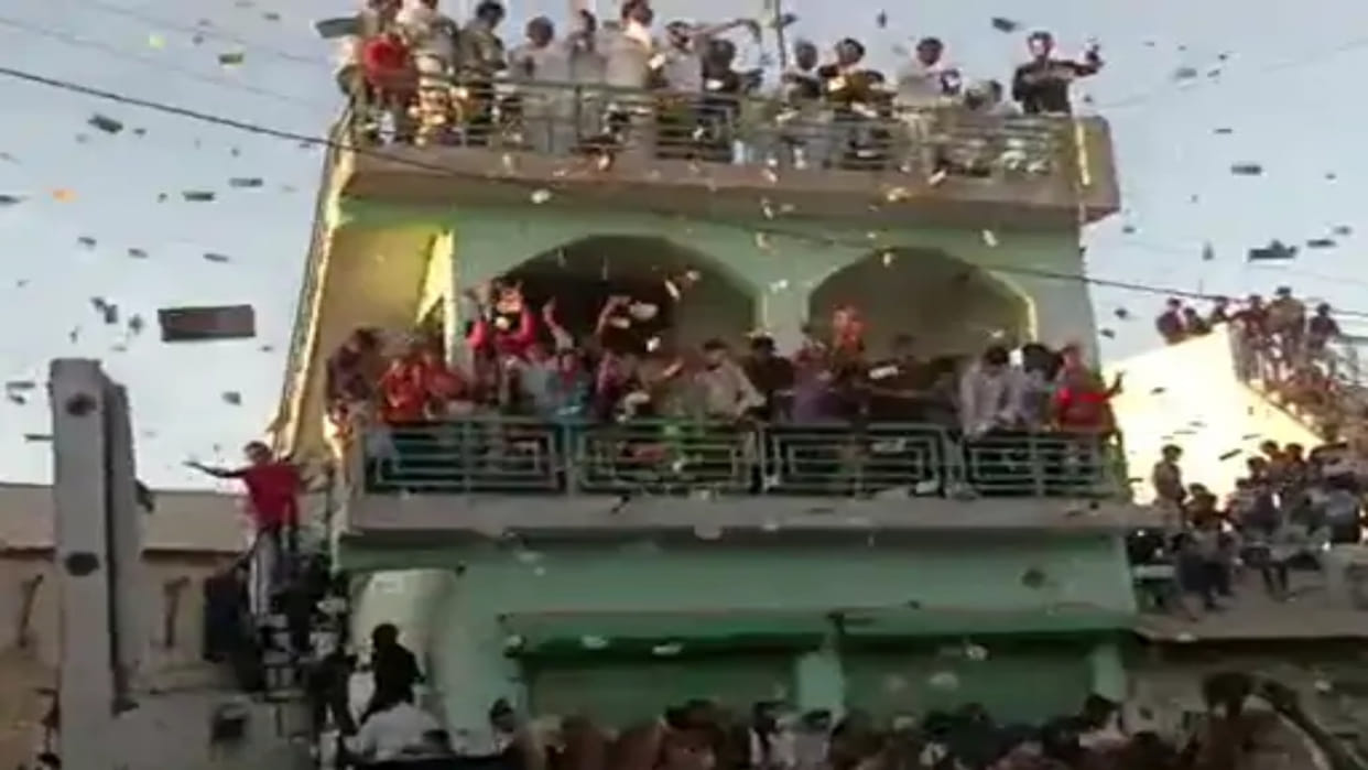 Gujarat Former sarpanch rained notes in nephews marriage crowd gathered to collect