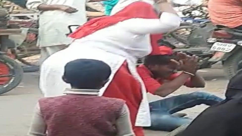 woman showered slippers on the youth freed herself and ran away