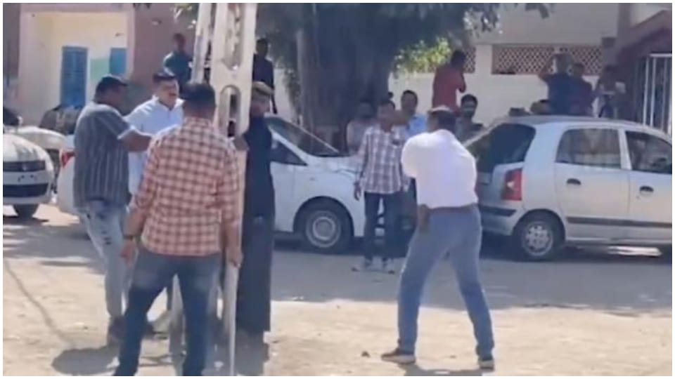 Gujarat: Police defends beating of minority accused in public, says it was done to control them