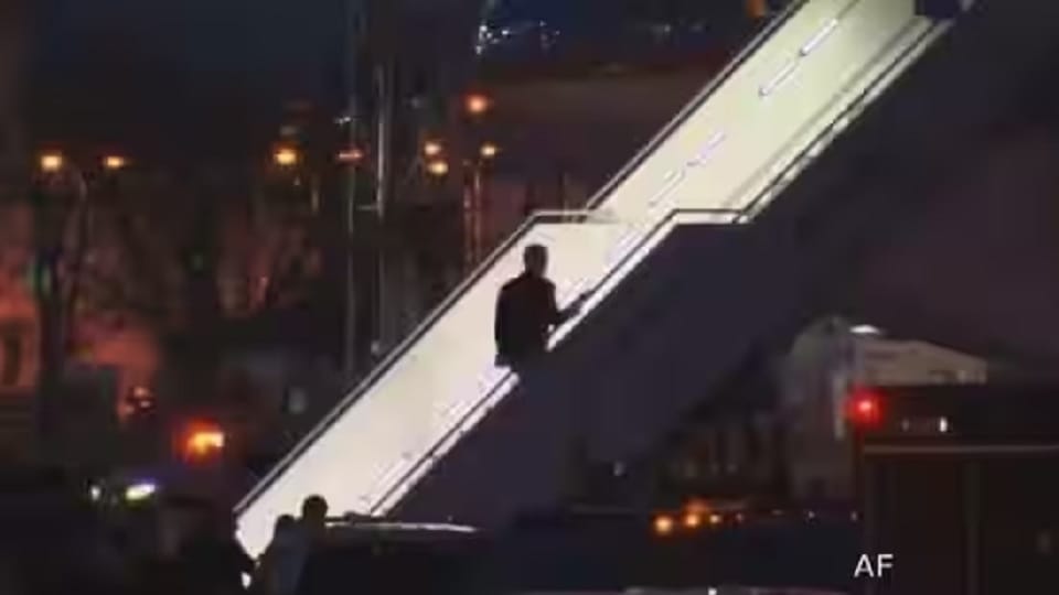 US president Joe Biden stumbles,falls while boarding Air Force One