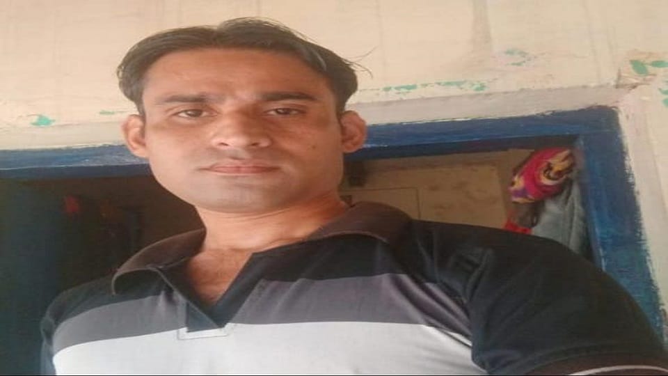 Dead body of a young man found under a tree in the field fear of murder