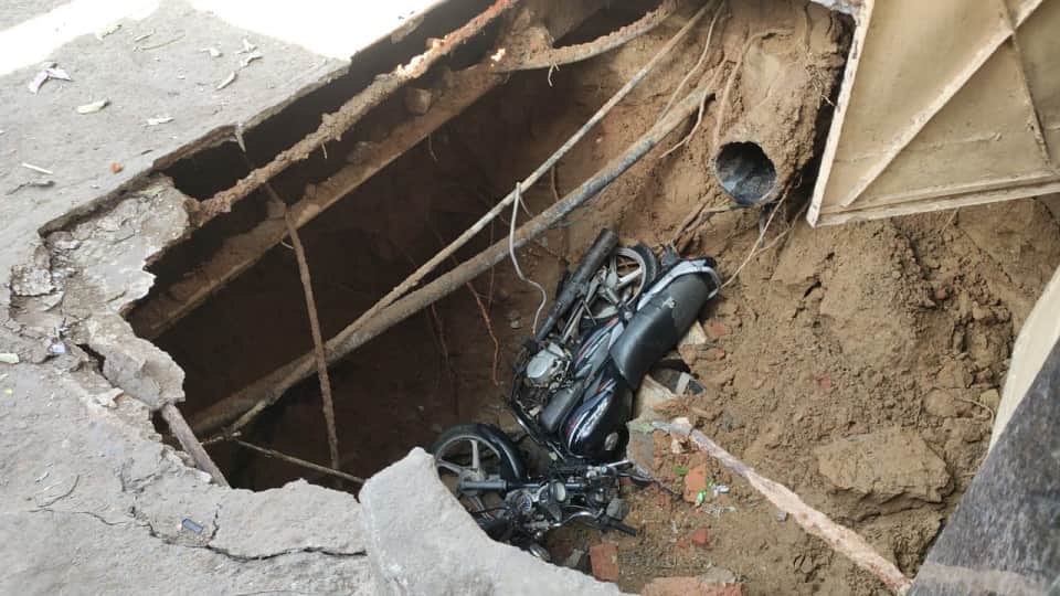 Due to the negligence of Delhi Jal Board land sunk in RK puram two motorcycles and a dog fell