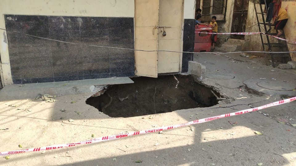 Due to the negligence of Delhi Jal Board land sunk in RK puram two motorcycles and a dog fell