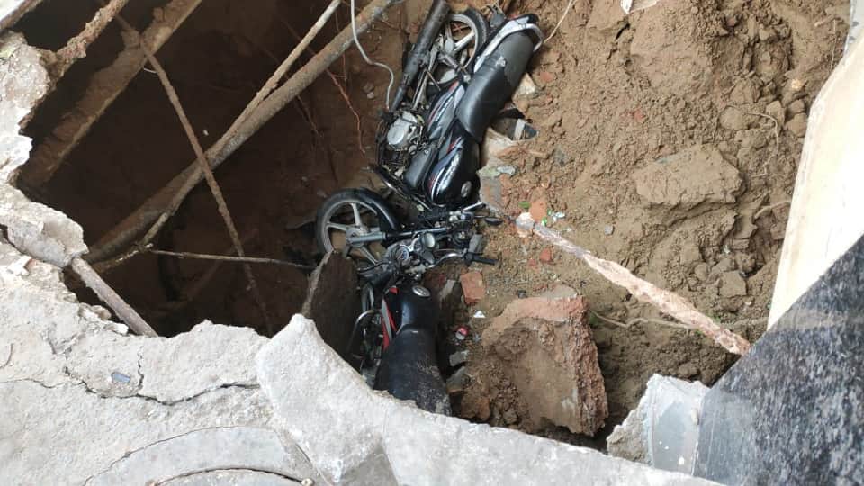 Due to the negligence of Delhi Jal Board land sunk in RK puram two motorcycles and a dog fell