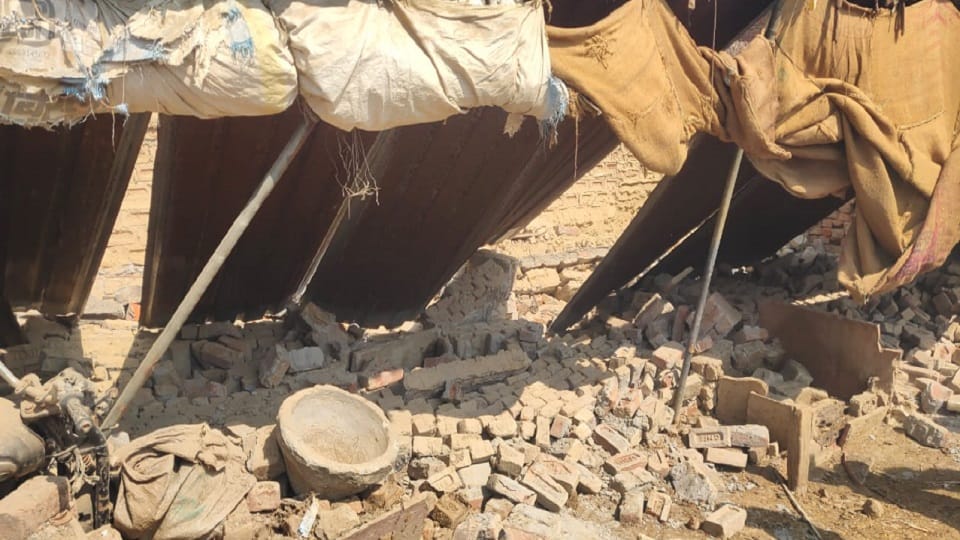 wall collapsed woman died due to being buried