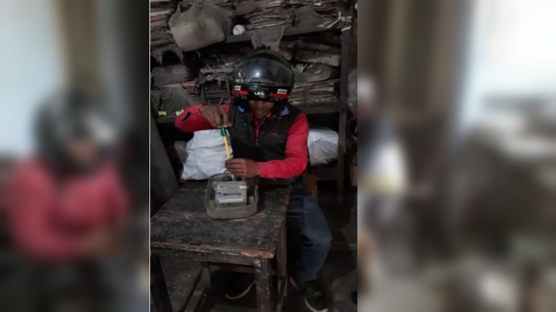 Employees working in office wearing helmet due to fear of death in Baghpat