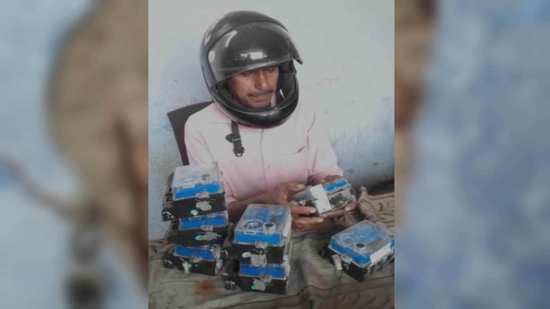 Employees working in office wearing helmet due to fear of death in Baghpat
