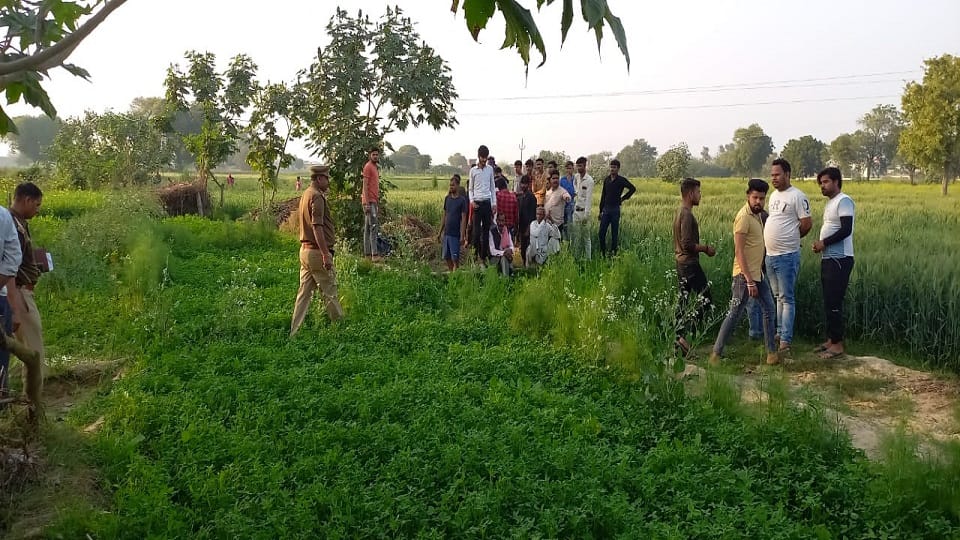 Woman blood stained body found in field clothes disheveled a young man in custody