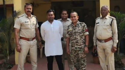 पुलिस गिरफ्त में फरार कैदी।