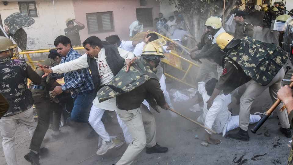 Police personnel gave water to sarpanches after lathicharge in Panchkula