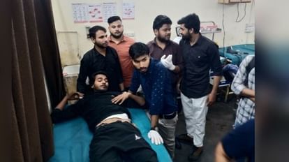 गोली लगने के बाद अस्पताल में भर्ती युवक