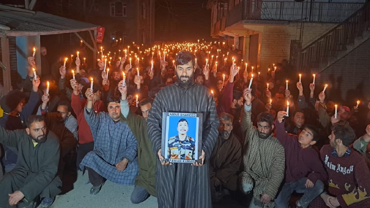 people of Padgampora paid tribute to martyr Pawan Kumar by taking out a candle march