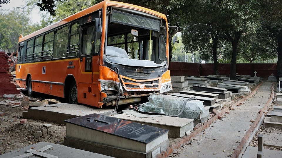 cluster bus entered the cemetery by breaking the boundary wall