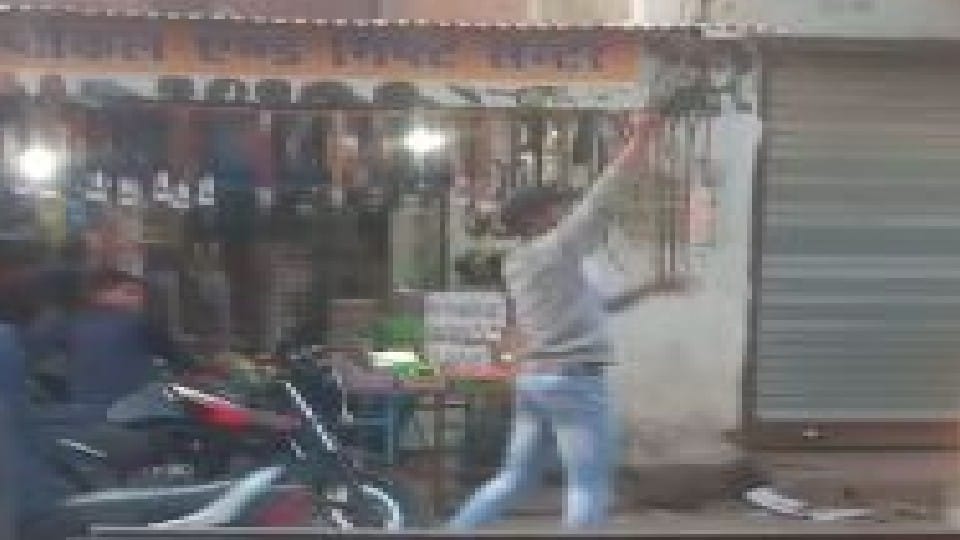 a man spreads panic by firing in front of liquor shop in bareilly