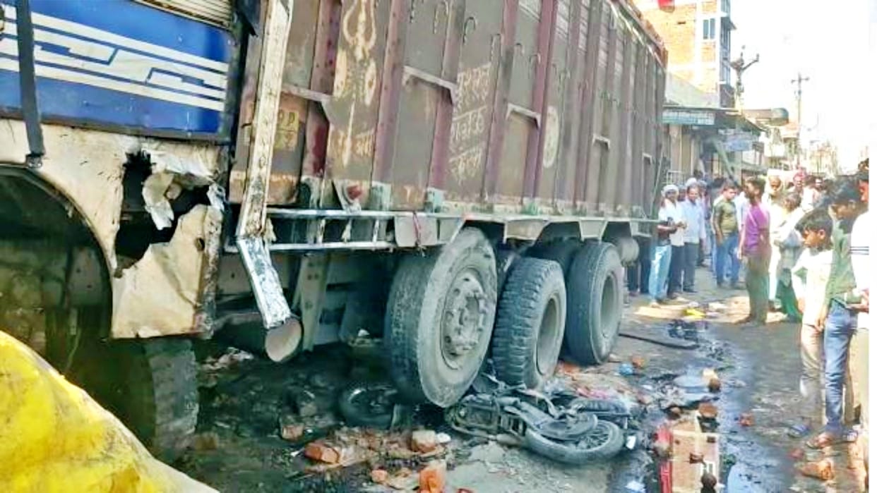 One person dies after being pressed under truck, eight people injured