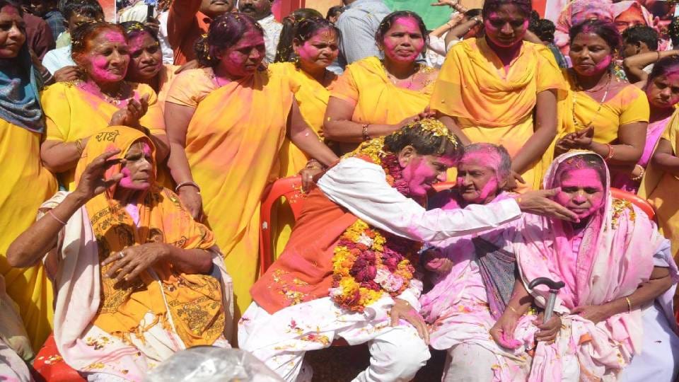 widows and destitute mothers played Holi of colors in Radha Gopinath temple In Vrindavan at mathura