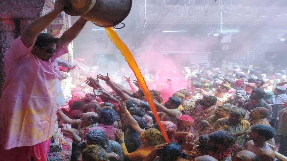 widows and destitute mothers played Holi of colors in Radha Gopinath temple In Vrindavan at mathura