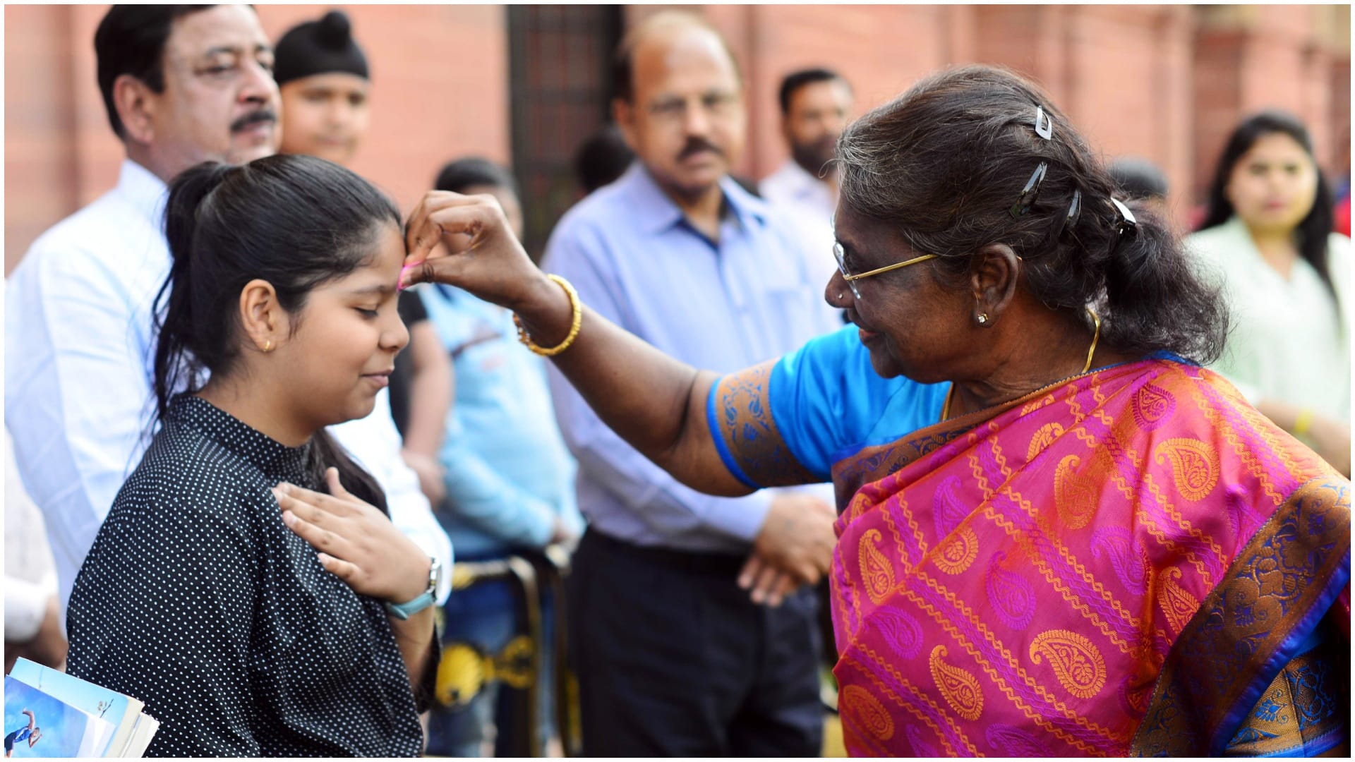 Holi 2023 PM Modi Celebrates Festival Of Colors President Droupadi Murmu extends greetings See Photos Videos