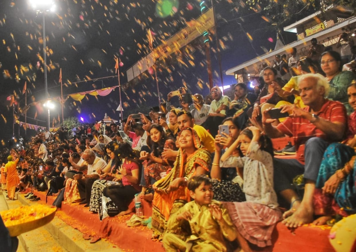Unique Holi of Kashi: Flowers showered on devotees during Ganga Aarti at Assi Ghat
