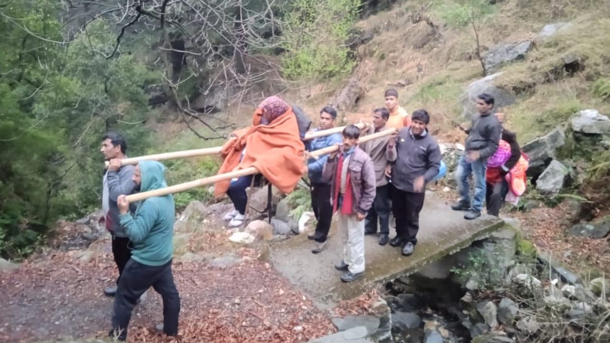 No road connectivity in Anni Kullu Pregang woman walk over four kilometer to reach home